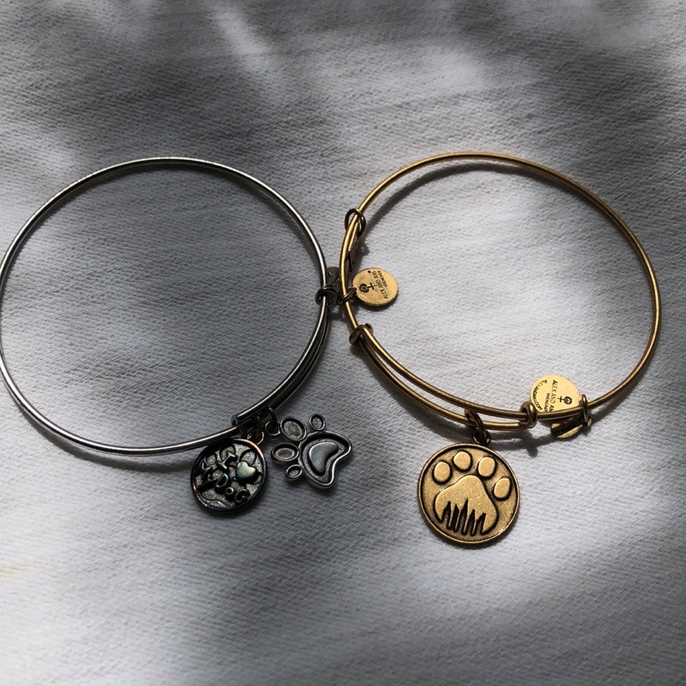 Two Alex and Ani paw print bracelets